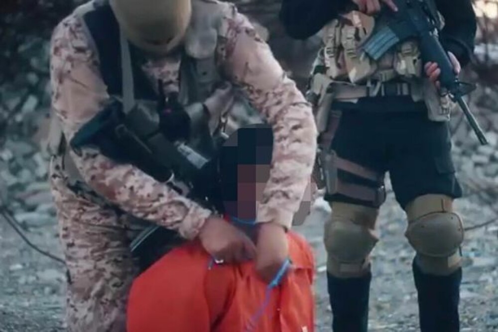 Zgarda exploziva - ultima metoda socanta de executie a ISIS. Teroristii au facut publica filmarea - Imaginea 2