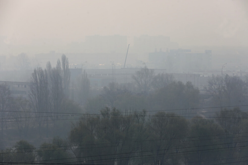 Kiev a devenit cel mai poluat oraş din lume după incendiile de la Cernobîl. GALERIE FOTO - Imaginea 6
