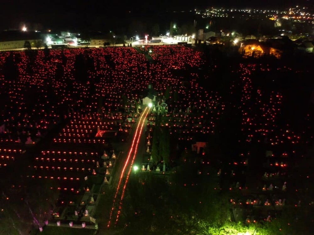 18.000 de candele, aprinse în cimitirele din Râmnicu Vâlcea în noaptea de Înviere - Imaginea 3