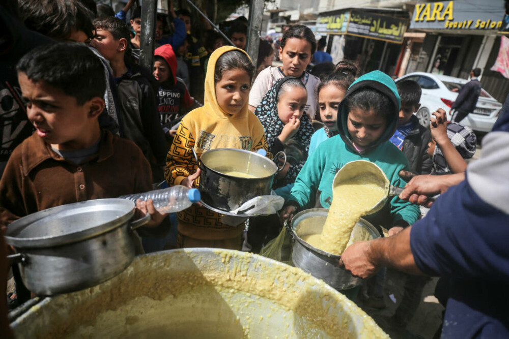Imaginile foametei din Gaza. Raport: Jumătate din populație va suferi de foamete în aproximativ trei luni | FOTO - Imaginea 2