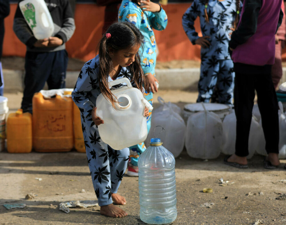 Imaginile foametei din Gaza. Raport: Jumătate din populație va suferi de foamete în aproximativ trei luni | FOTO - Imaginea 16