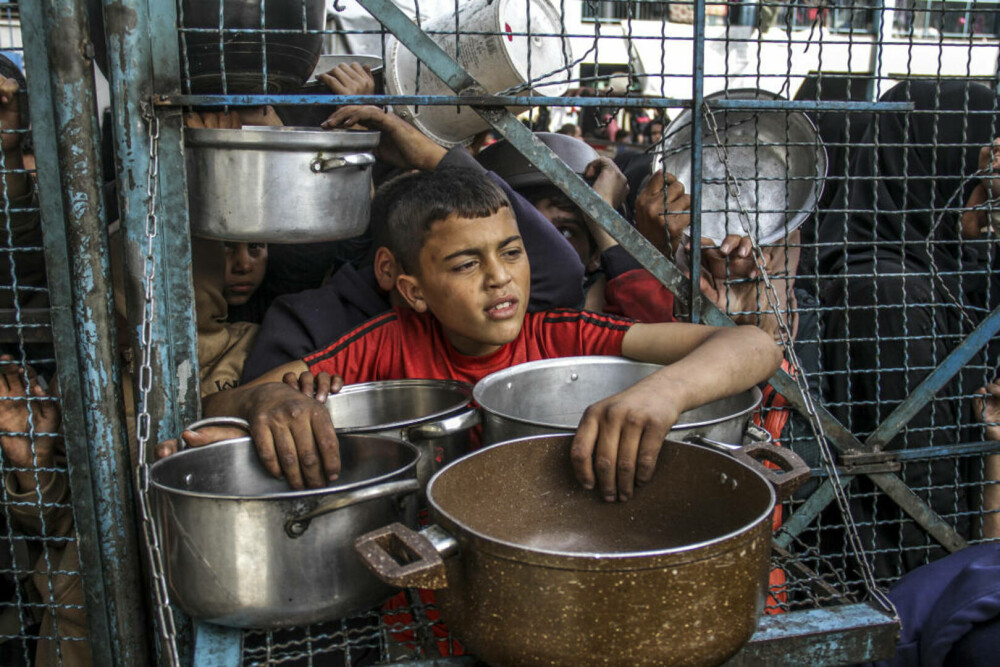 Imaginile foametei din Gaza. Raport: Jumătate din populație va suferi de foamete în aproximativ trei luni | FOTO - Imaginea 32