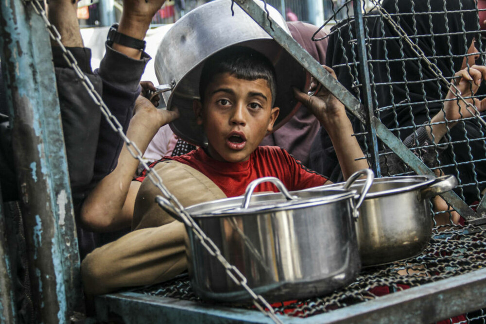 Imaginile foametei din Gaza. Raport: Jumătate din populație va suferi de foamete în aproximativ trei luni | FOTO - Imaginea 34