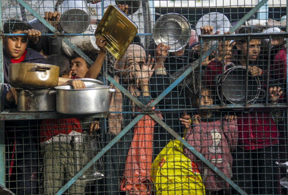 Imaginile foametei din Gaza. Raport: Jumătate din populație va suferi de foamete în aproximativ trei luni | FOTO - Imaginea 38