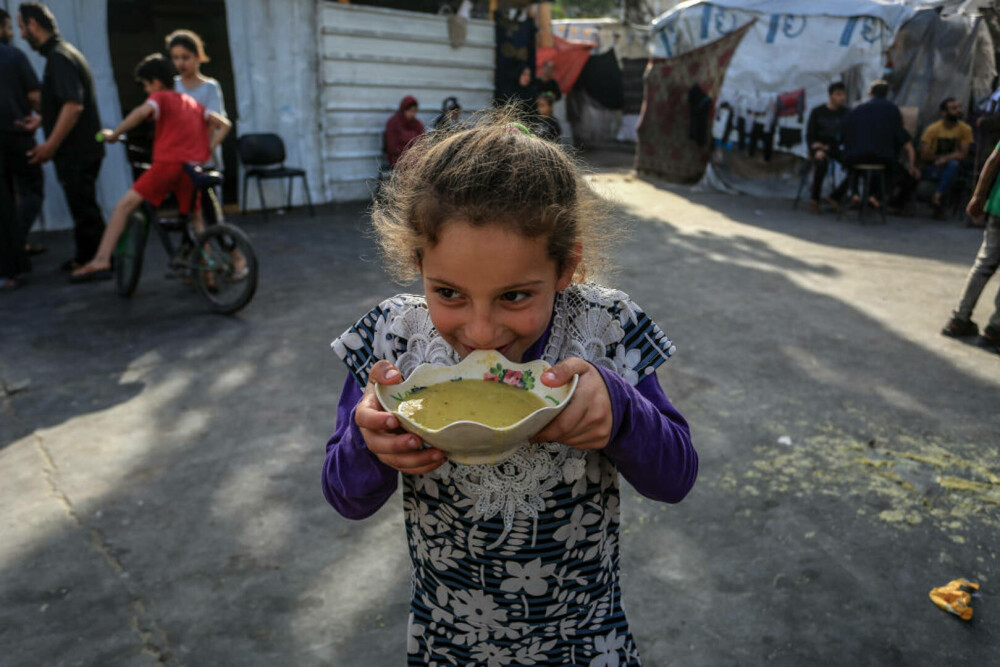 Imaginile foametei din Gaza. Raport: Jumătate din populație va suferi de foamete în aproximativ trei luni | FOTO - Imaginea 42