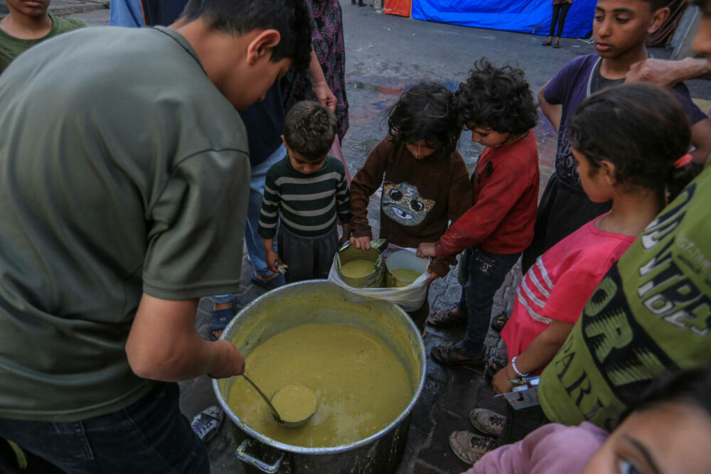 Imaginile foametei din Gaza. Raport: Jumătate din populație va suferi de foamete în aproximativ trei luni | FOTO - Imaginea 45