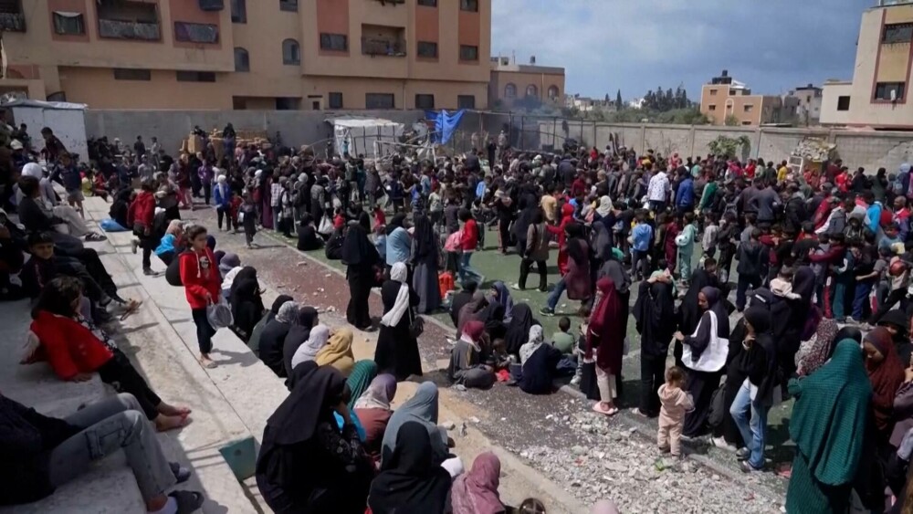 Palestinienii așteaptă ore întregi pentru o porție de orez gratis, în Fâșia Gaza. „Nu există mâncare, nici apă de băut” - Imaginea 3