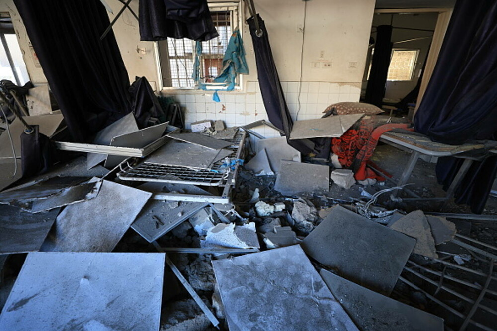 Șeful OMS acuză: Un copil a murit în Gaza, după ce Israelul a lovit spitalul Al-Ahli în care se afla. FOTO - Imaginea 8