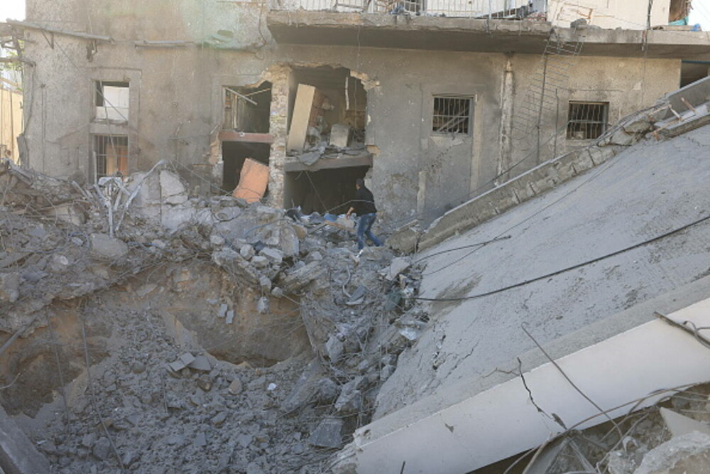 Șeful OMS acuză: Un copil a murit în Gaza, după ce Israelul a lovit spitalul Al-Ahli în care se afla. FOTO - Imaginea 12