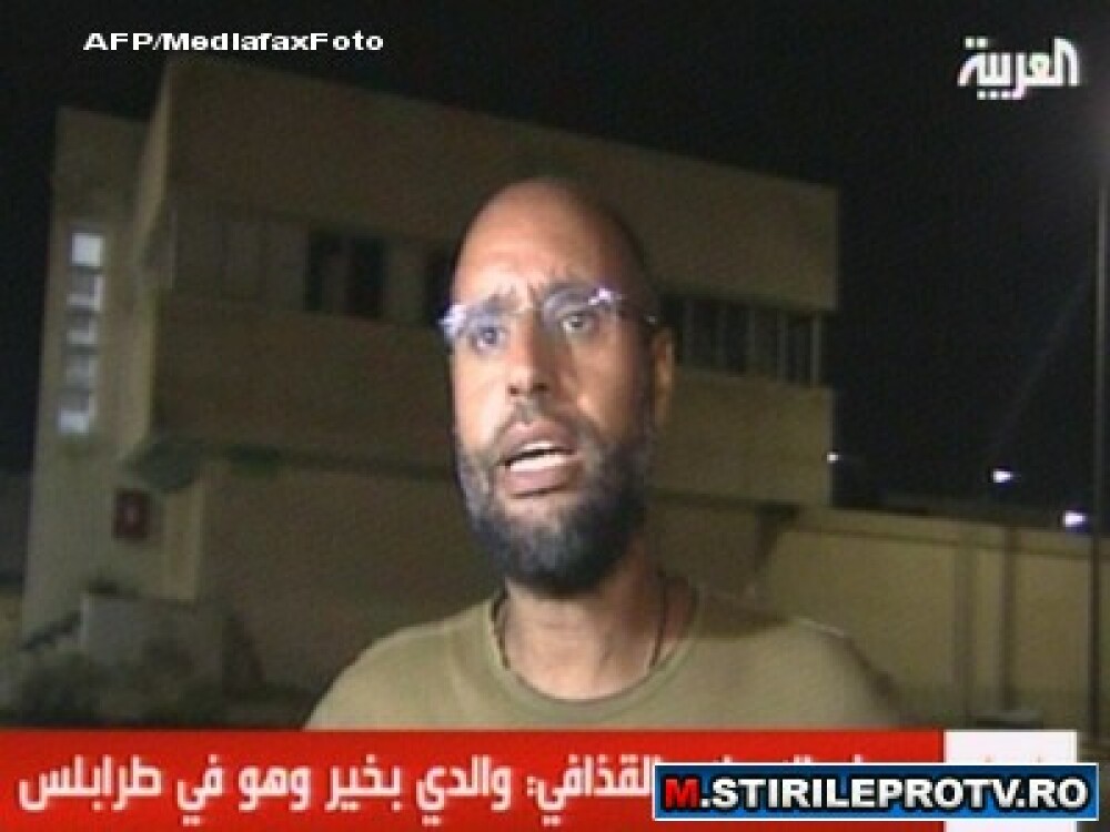 A cazut si ultima reduta la Tripoli. Rebelii au intrat in resedinta lui Ghaddafi. VIDEO - Imaginea 2