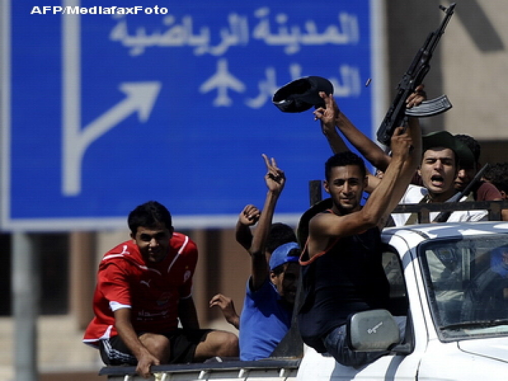 A cazut si ultima reduta la Tripoli. Rebelii au intrat in resedinta lui Ghaddafi. VIDEO - Imaginea 1