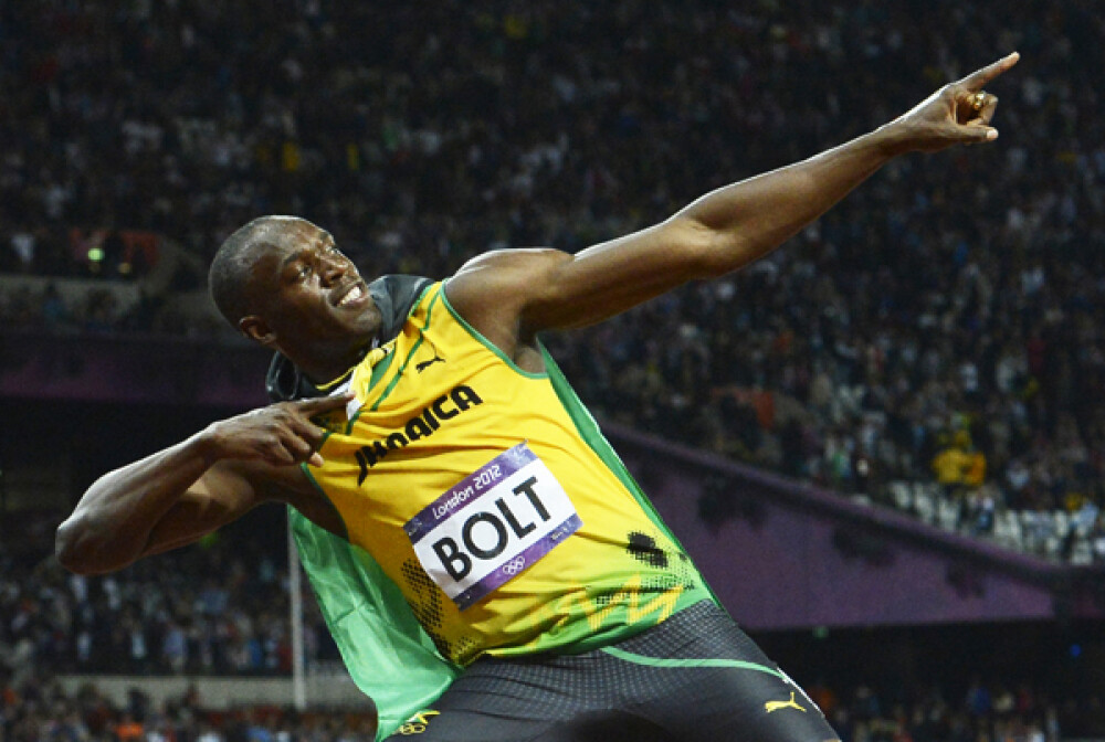Cine e Usain Bolt, omul care si-ar putea face o statuie de aur din propriile medalii - Imaginea 4