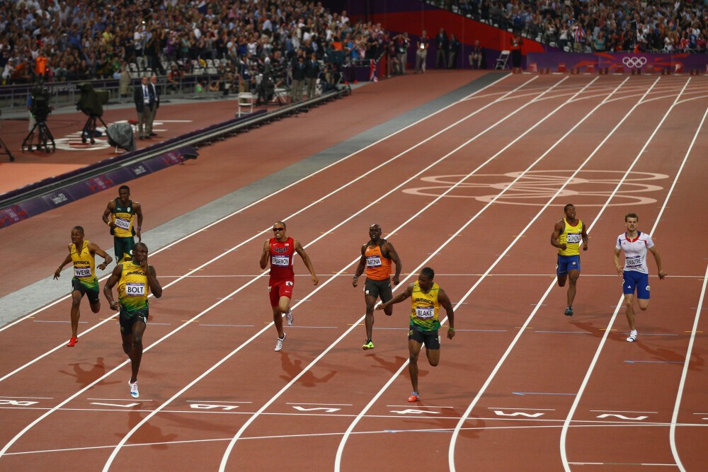 Cine e Usain Bolt, omul care si-ar putea face o statuie de aur din propriile medalii - Imaginea 3