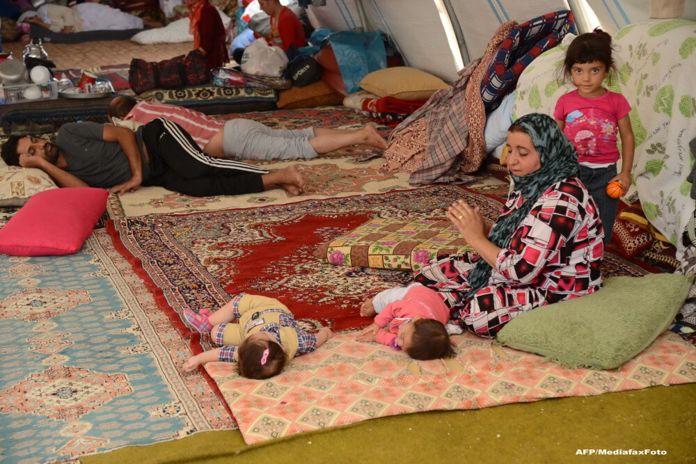 Statul Islamic aduce iadul pe pamant. Irakienii refugiati le dau copiilor sa bea sange pentru a-i mentine in viata - Imaginea 1