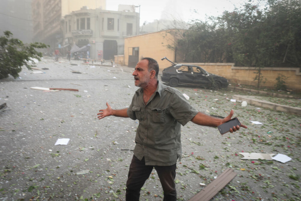 GALERIE FOTO. Doi ani de la explozia din Beirut, soldată cu peste 200 de morţi. Experţi ONU cer o anchetă internaţională - Imaginea 7