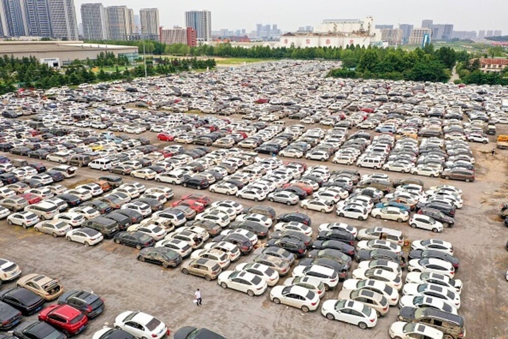Un imens cimitir cu peste 200.000 de maşini a apărut în China, după inundaţiille devastatoare. GALERIE FOTO - Imaginea 7