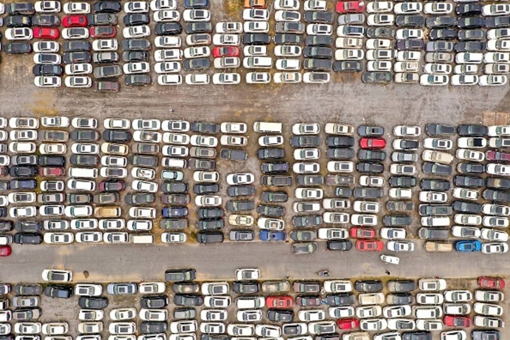 Un imens cimitir cu peste 200.000 de maşini a apărut în China, după inundaţiille devastatoare. GALERIE FOTO - Imaginea 6
