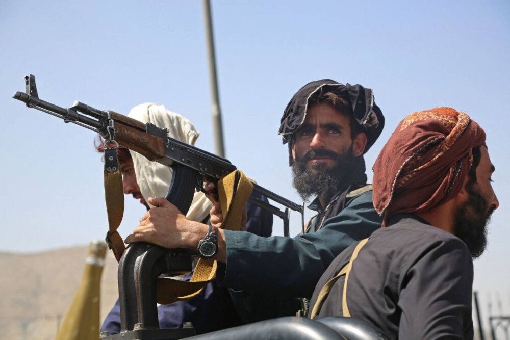 Talibanii sărbătoresc plecarea trupelor americane din Afganistan, sfârşitul unui război devastator de 20 de ani - Imaginea 8