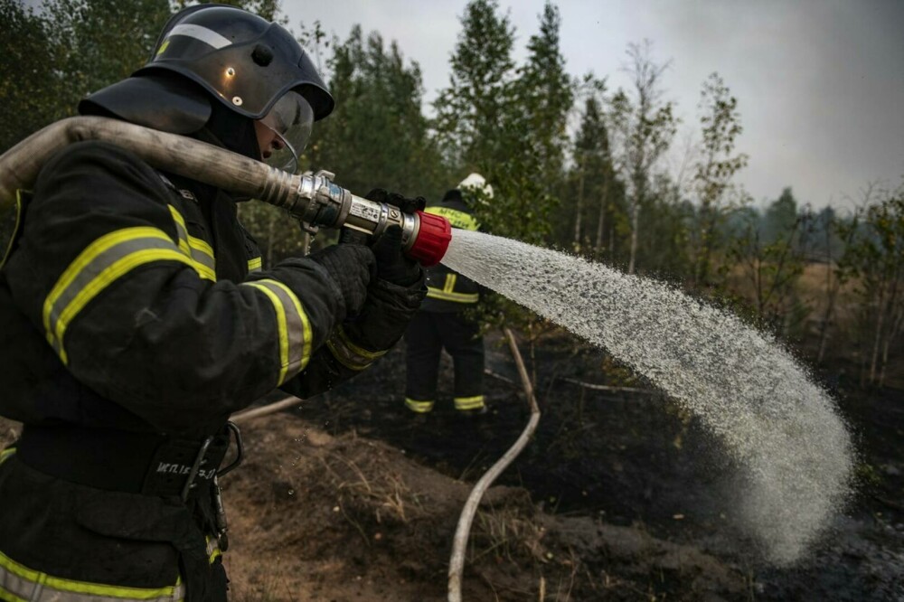 Stare de urgență în Rusia din cauza incendiilor. Peste 8.000 de hectare de păduri sunt afectate | GALERIE FOTO - Imaginea 13