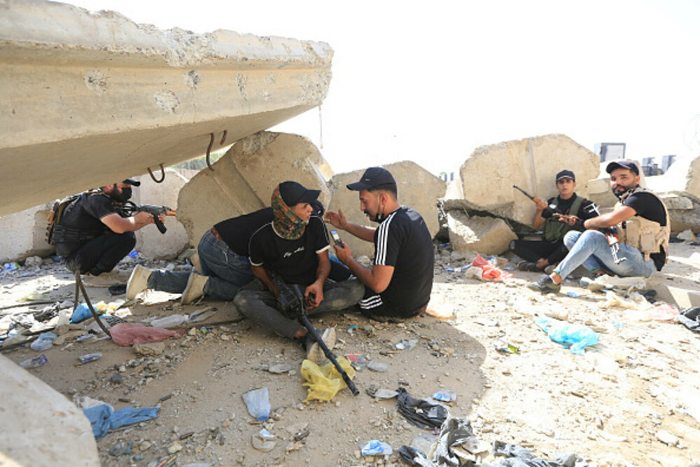 Violențele continuă în Irak. Cel puțin 5 de persoane au murit și alte 450 au fost rănite - Imaginea 14