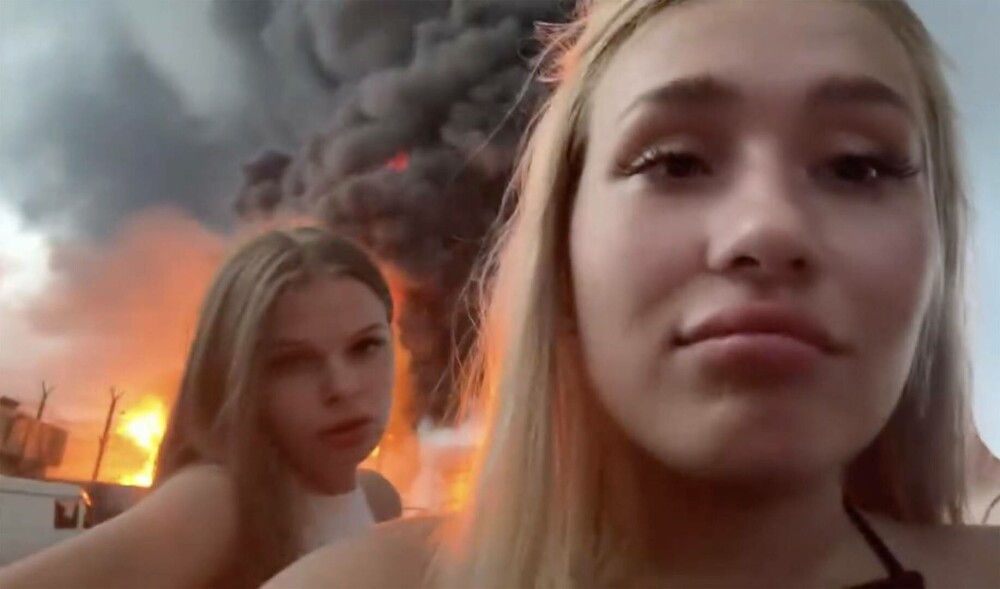 Trei tineri din Rusia, reținuți după ce s-au filmat în fața unui depozit de carburanți incendiat de drone ucrainene. VIDEO - Imaginea 3