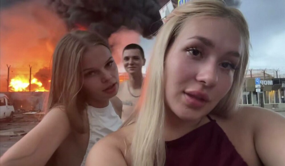 Trei tineri din Rusia, reținuți după ce s-au filmat în fața unui depozit de carburanți incendiat de drone ucrainene. VIDEO - Imaginea 5