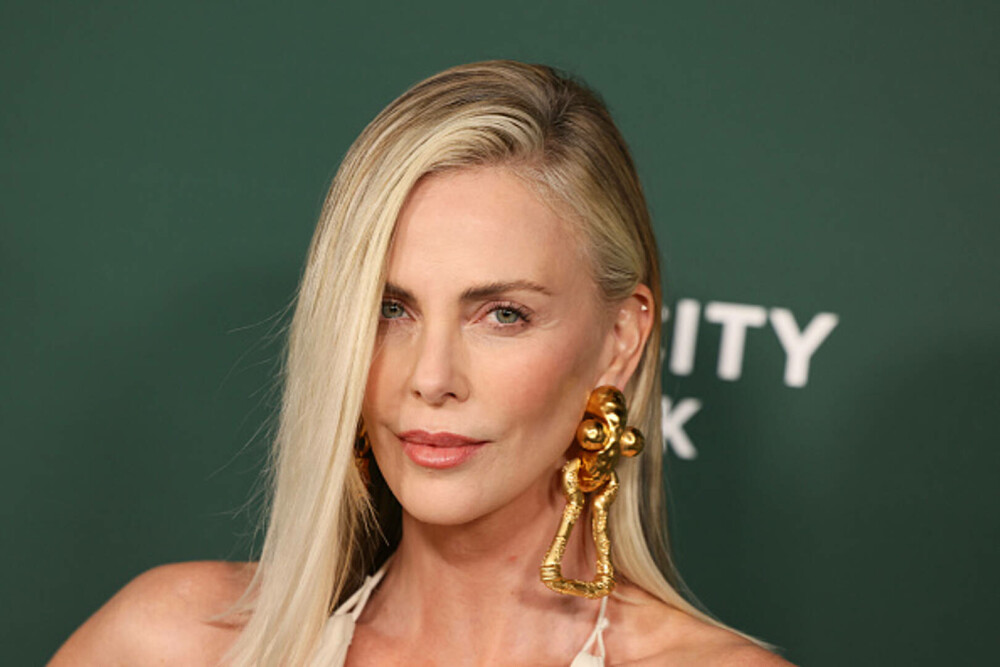 Charlize Theron împlinește 50 de ani. A visat să fie balerină, dar a cucerit Hollywoodul. Imagini de colecție | GALERIE FOTO - Imaginea 6