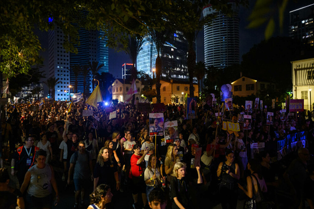 Mii de israelieni au protestat față de ofensiva din Gaza, după decizia guvernului Netanyahu de a ocupa orașul - Imaginea 3