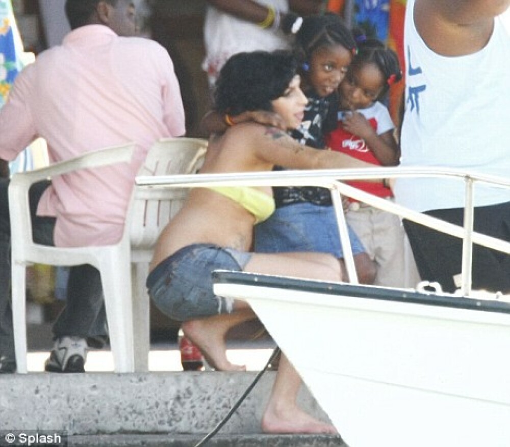 Amy Winehouse vrea sa se mute in Caraibe - Imaginea 5