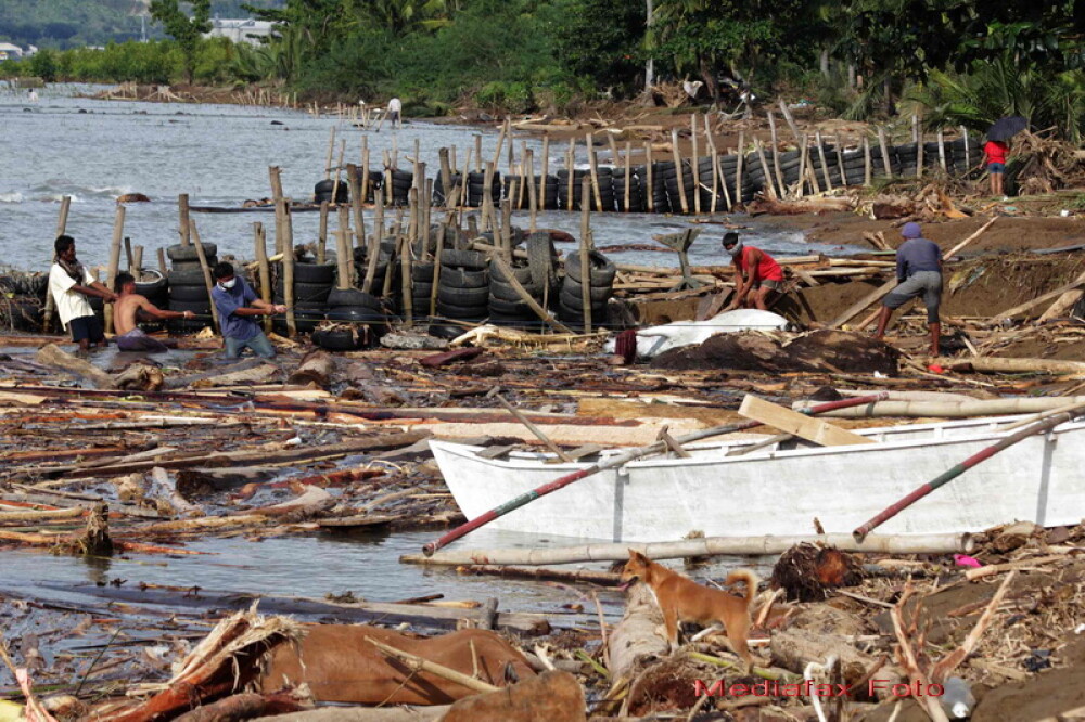 Bilantul furtunii tropicale din Filipine depaseste o mie de morti. GALERIE FOTO - Imaginea 2