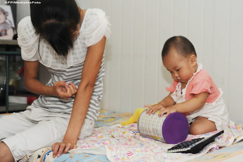 Drama mamelor din China. Risca inschisoarea si amenzi de zeci de mii de dolari pentru al 2-lea copil - Imaginea 1