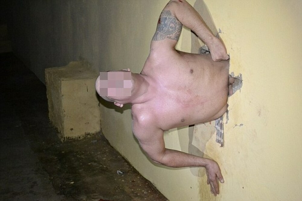 Tentativa nereusita de evadare: prizonierul a ramas blocat in peretele celulei. GALERIE FOTO - Imaginea 3