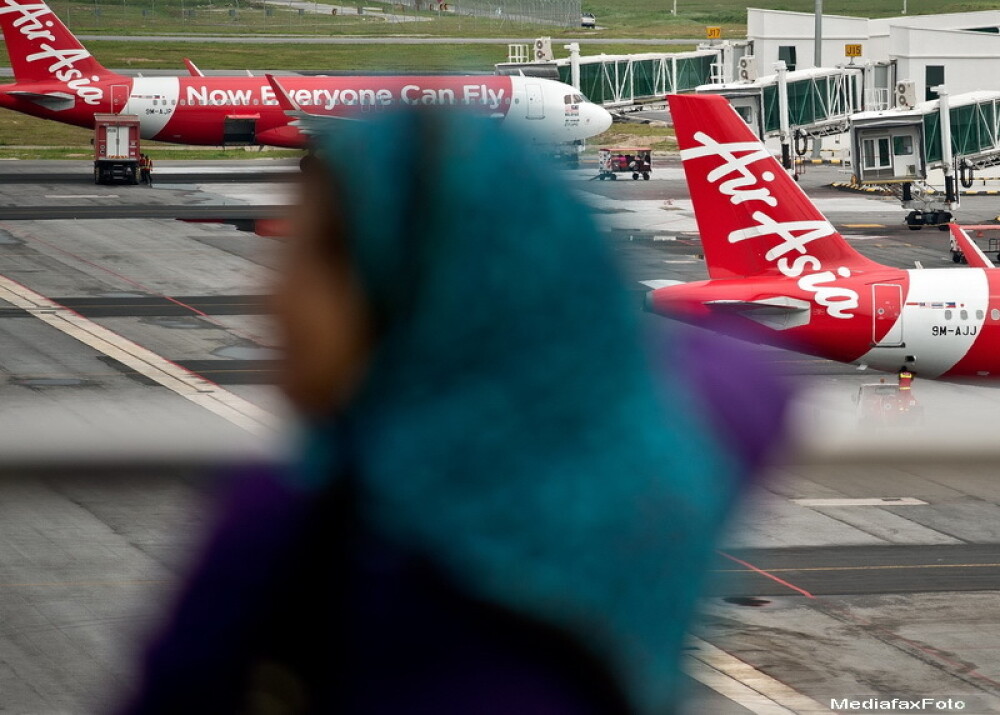 Un avion AirAsia cu 162 de persoane la bord a disparut de pe radare. Operatiunile de cautare au fost oprite - Imaginea 4