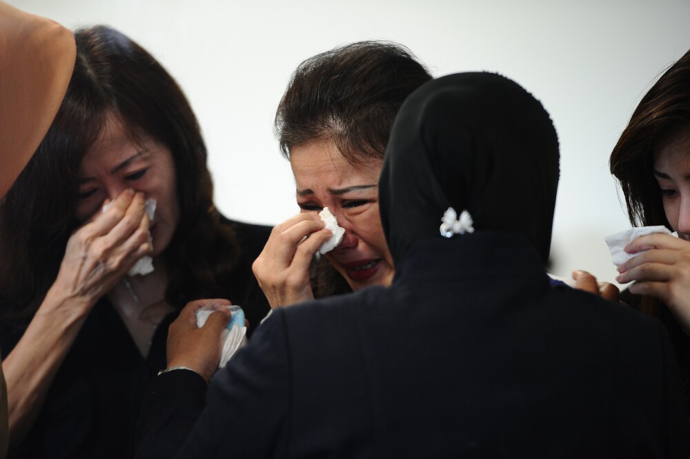 Imagini cu pasagerii avionului AirAsia inainte de tragedie, prezentate intr-un material special de CNN. VIDEO emotionant - Imaginea 7