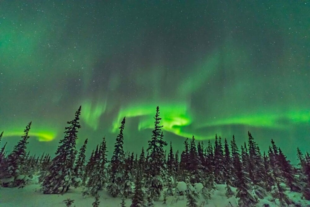 Orășelul unde se vede aurora boreală 300 de nopți pe an. Ce îl face locul perfect pentru a vedea spectacolul celest - Imaginea 5