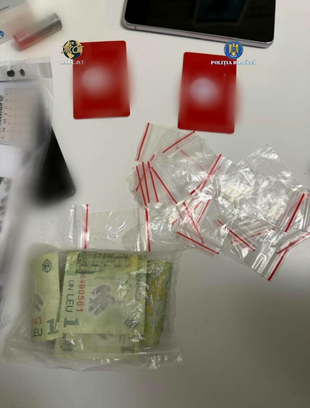 Percheziții de amploare la o rețea de traficanţi care introducea droguri în penitenciare. O avocată, vizată. VIDEO - Imaginea 1