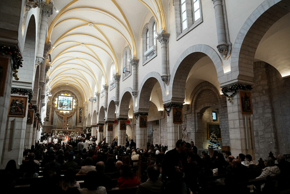 Primul Crăciun în Betleem după doi ani de război în Gaza: parade, colinde și tradiții reluate în umbra crizei umanitare. FOTO - Imaginea 2