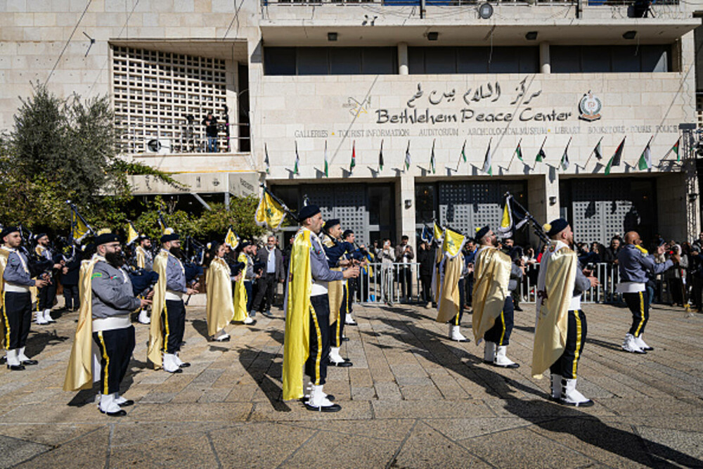 Primul Crăciun în Betleem după doi ani de război în Gaza: parade, colinde și tradiții reluate în umbra crizei umanitare. FOTO - Imaginea 4