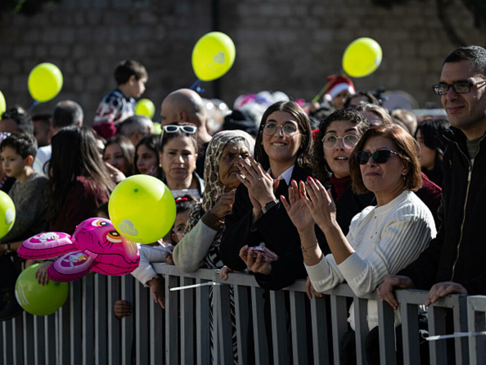 Primul Crăciun în Betleem după doi ani de război în Gaza: parade, colinde și tradiții reluate în umbra crizei umanitare. FOTO - Imaginea 10