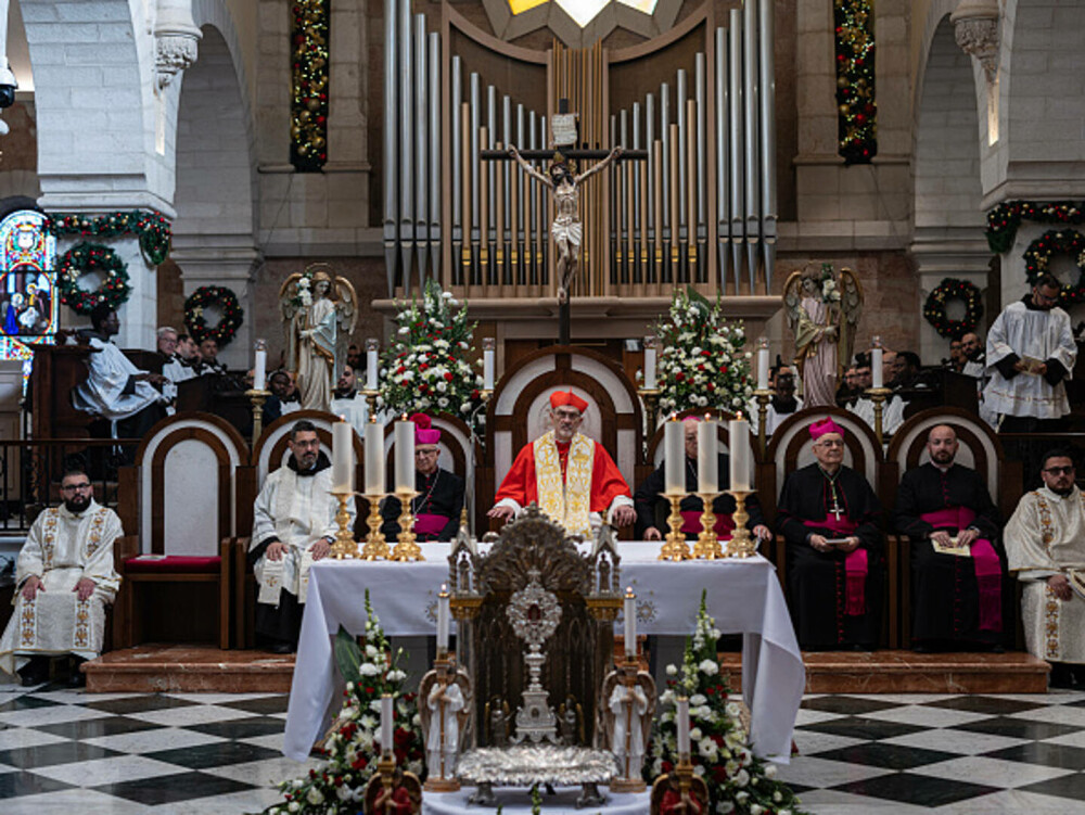 Primul Crăciun în Betleem după doi ani de război în Gaza: parade, colinde și tradiții reluate în umbra crizei umanitare. FOTO - Imaginea 21