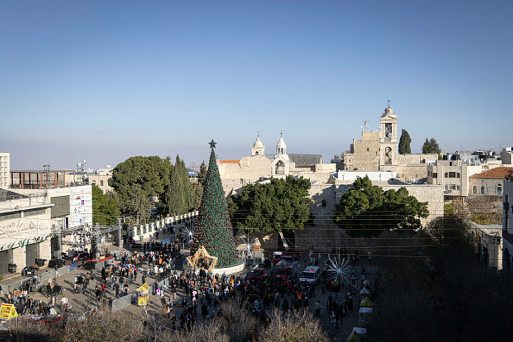 Primul Crăciun în Betleem după doi ani de război în Gaza: parade, colinde și tradiții reluate în umbra crizei umanitare. FOTO - Imaginea 22