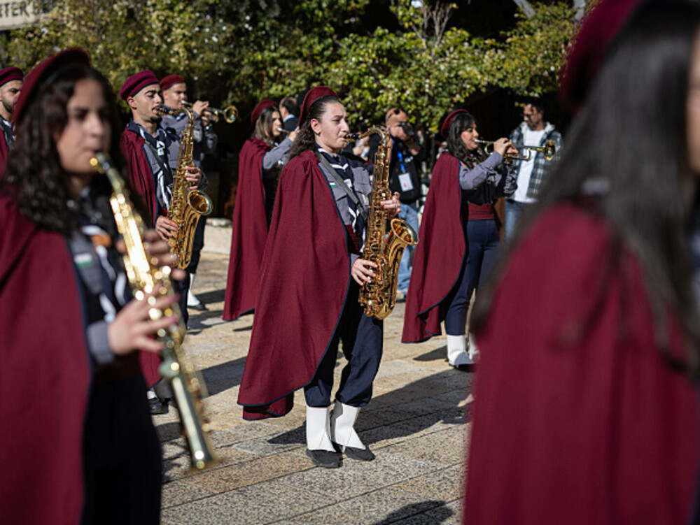 Primul Crăciun în Betleem după doi ani de război în Gaza: parade, colinde și tradiții reluate în umbra crizei umanitare. FOTO - Imaginea 23