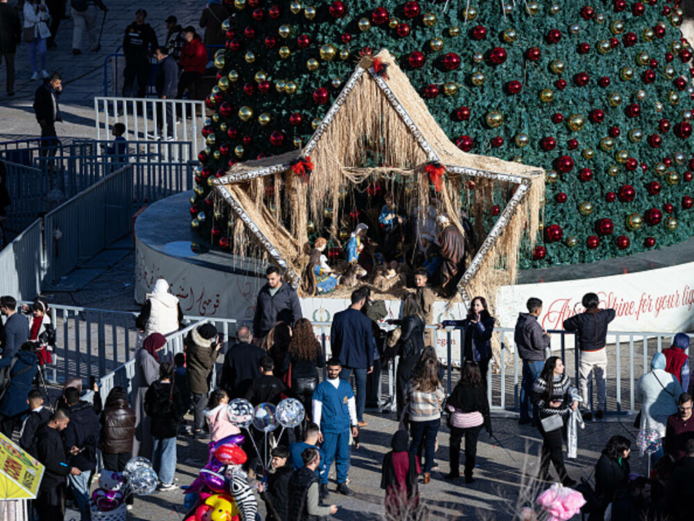 Primul Crăciun în Betleem după doi ani de război în Gaza: parade, colinde și tradiții reluate în umbra crizei umanitare. FOTO - Imaginea 26