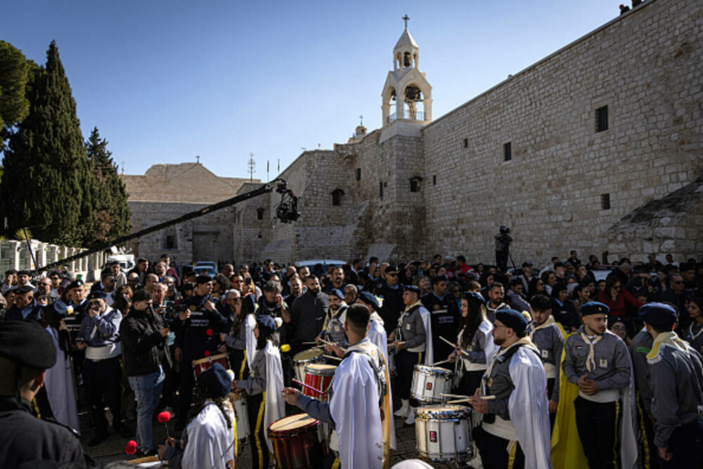 Primul Crăciun în Betleem după doi ani de război în Gaza: parade, colinde și tradiții reluate în umbra crizei umanitare. FOTO - Imaginea 29