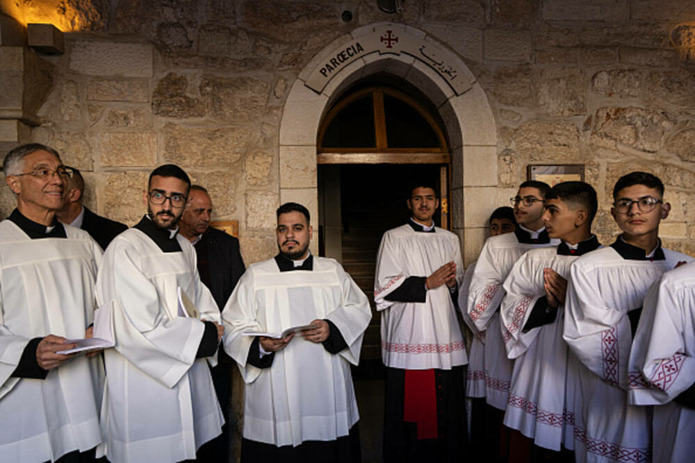 Primul Crăciun în Betleem după doi ani de război în Gaza: parade, colinde și tradiții reluate în umbra crizei umanitare. FOTO - Imaginea 30