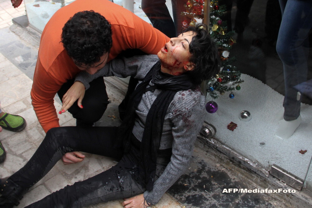 Un fotoreporter egiptean a imortalizat momentul in care o protestatara e ucisa. Povestea emotionanta din spatele fotografiei - Imaginea 4