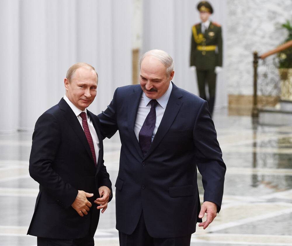 Momentele cheie ale summit-ului de la MINSK in imagini. De la presupusul creion rupt de Putin la dialoguri tensionate - Imaginea 3