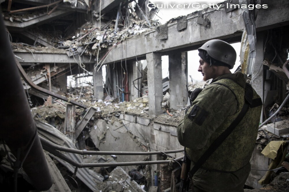 Apocalipsa din estul Ucrainei. Peisajul dezolant din Donetk aduce aminte de sfarsitul celui de-Al Doilea Razboi Mondial. FOTO - Imaginea 2