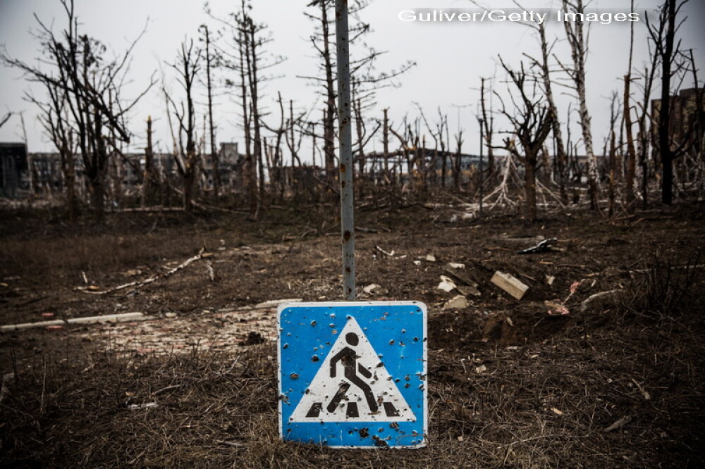 Apocalipsa din estul Ucrainei. Peisajul dezolant din Donetk aduce aminte de sfarsitul celui de-Al Doilea Razboi Mondial. FOTO - Imaginea 8