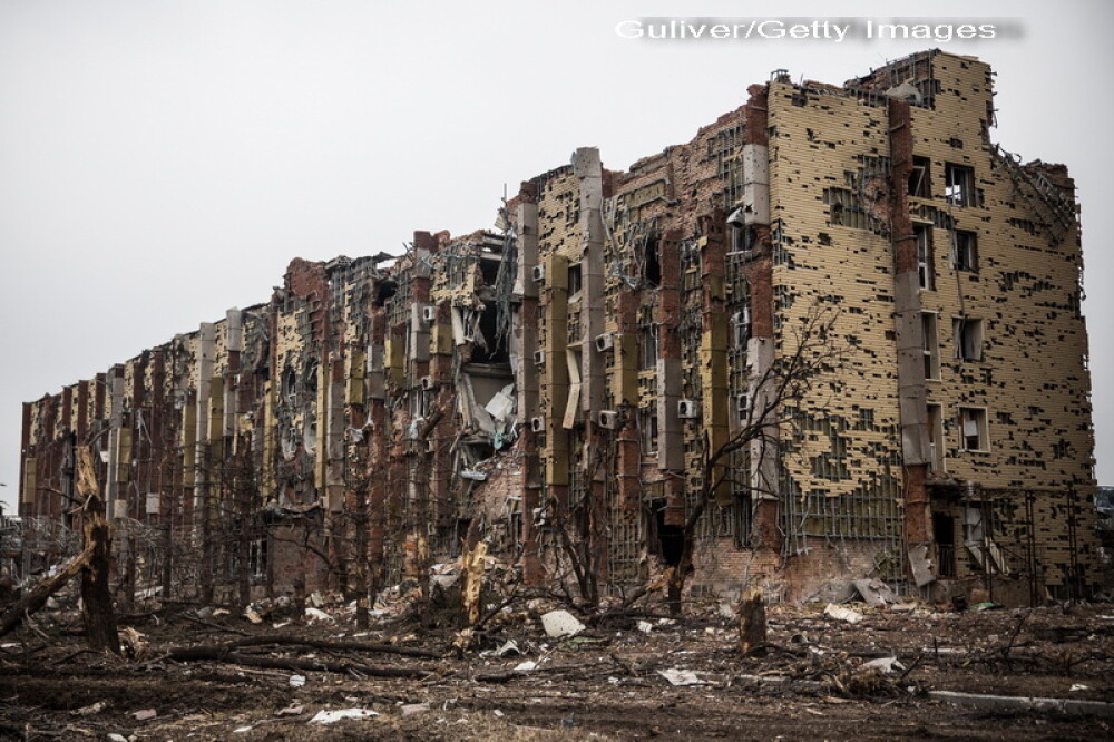 Apocalipsa din estul Ucrainei. Peisajul dezolant din Donetk aduce aminte de sfarsitul celui de-Al Doilea Razboi Mondial. FOTO - Imaginea 9